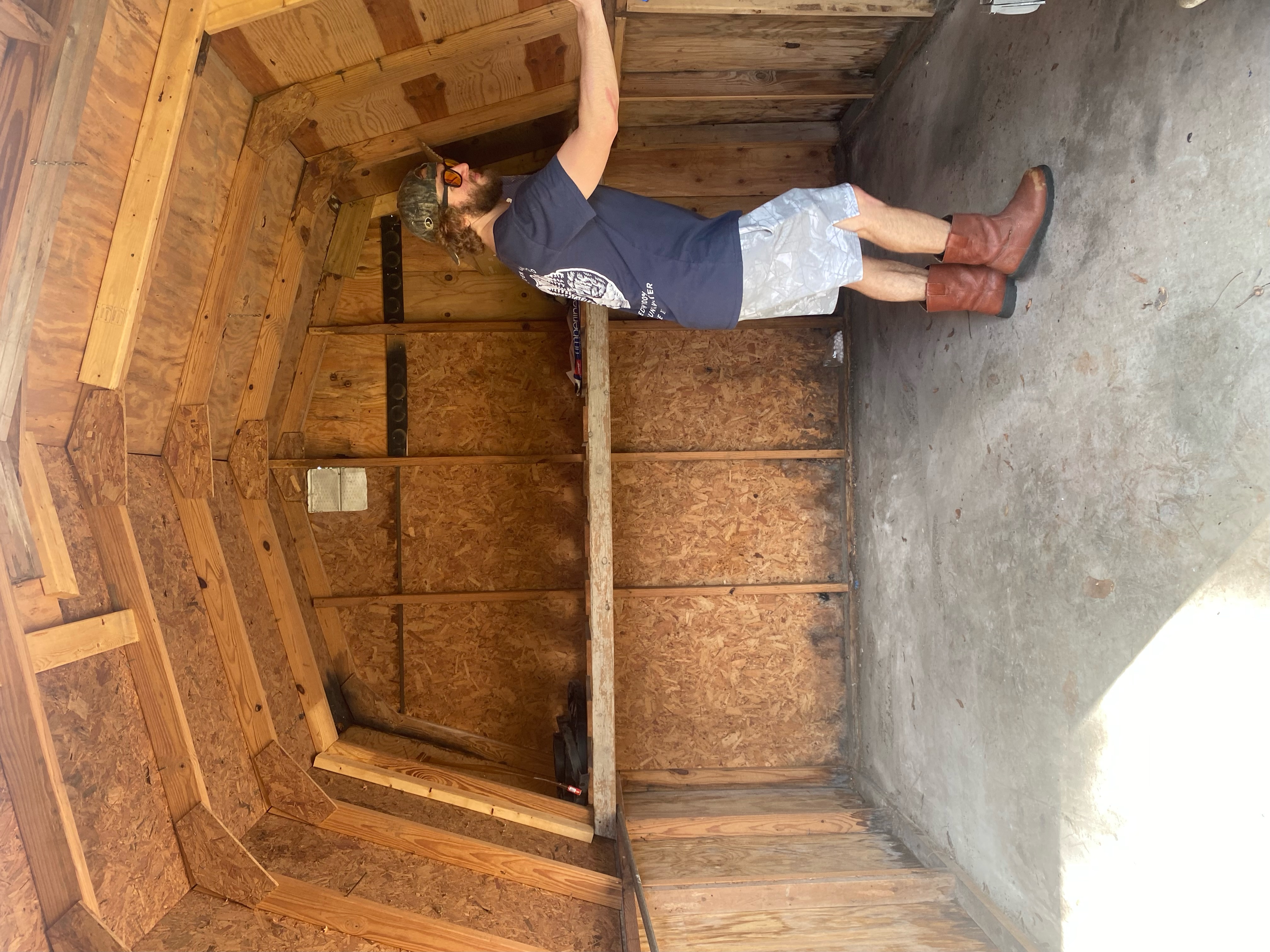 Plumber repairing burst pipe